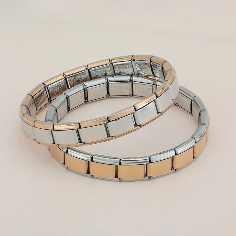 Silver and rose gold charm bracelets together